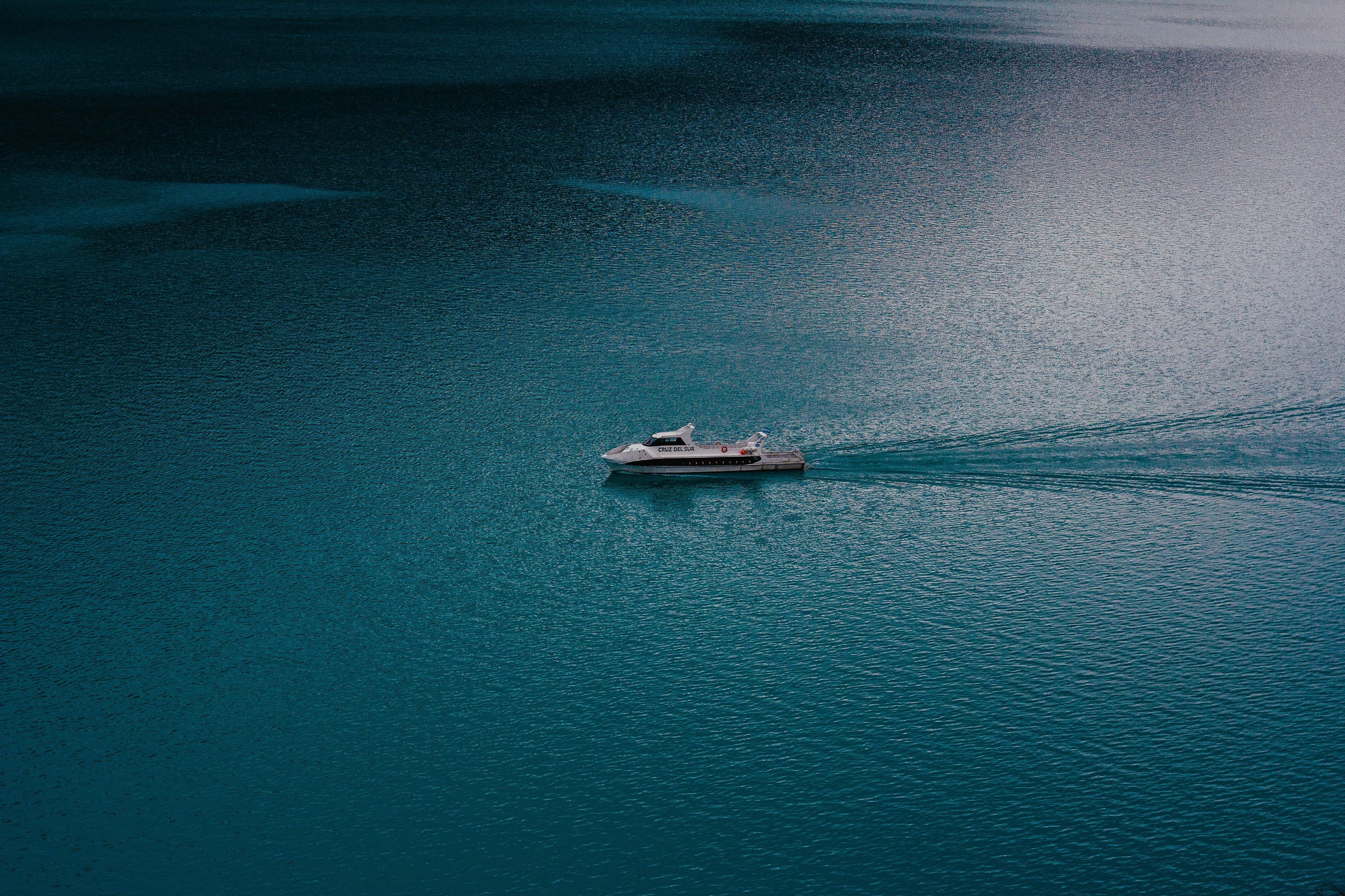 Sailing yacht on the open ocean at golden hour